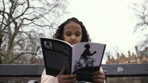 Young Bermudian Girl reading the book of Mary Prince